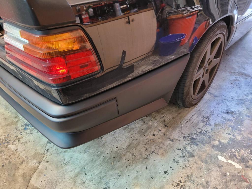 85-97 MERCEDES W124 2.0 AMG STYLE REAR BUMPER COVER SEDAN ONLY.